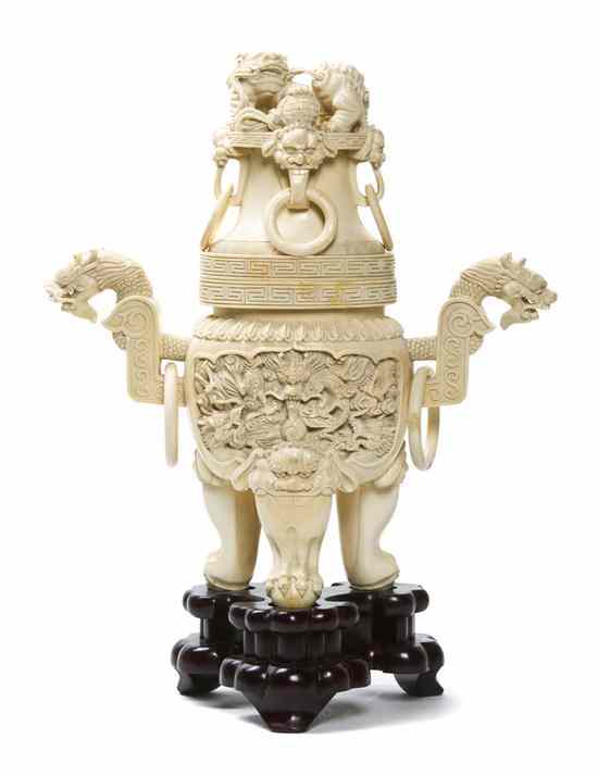 Appraisal: A Chinese Ivory Tripod Censer having fu dog-form finial with