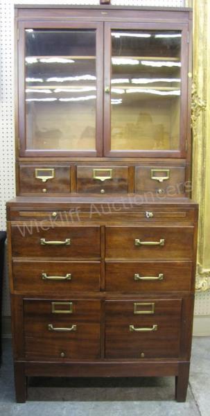 Appraisal: An antique Globe physician or dentist's office cabinet with metal