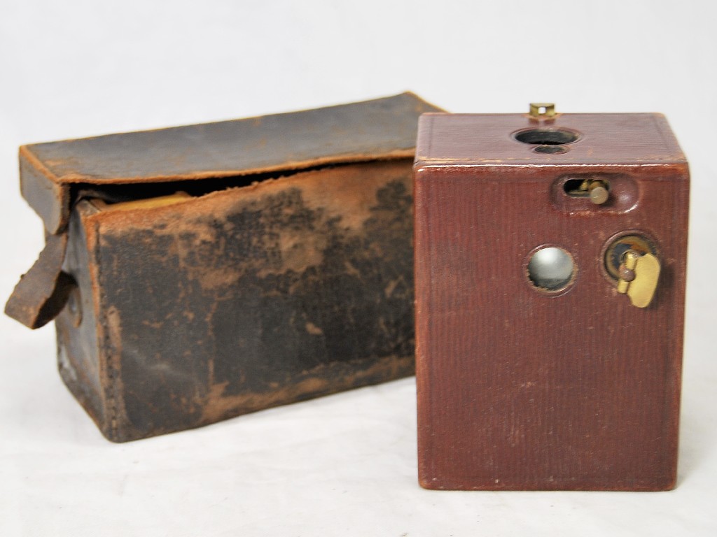 Appraisal: A th centruy pocket Kodak box camera in red morocco