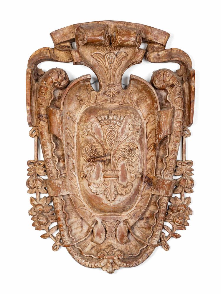 Appraisal: A Baroque Style Carved Wood Cartouche-Form Armorial Plaque Height x