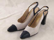 Appraisal: A pair of leather lady's shoes in pearl white with