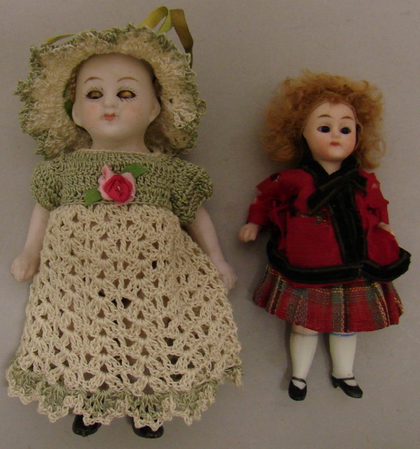 Appraisal: Pair of wire strung dolls German with stationary glass eyes