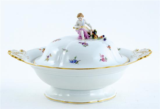 Appraisal: Meissen porcelain covered tureen figural finial on paneled dome cover