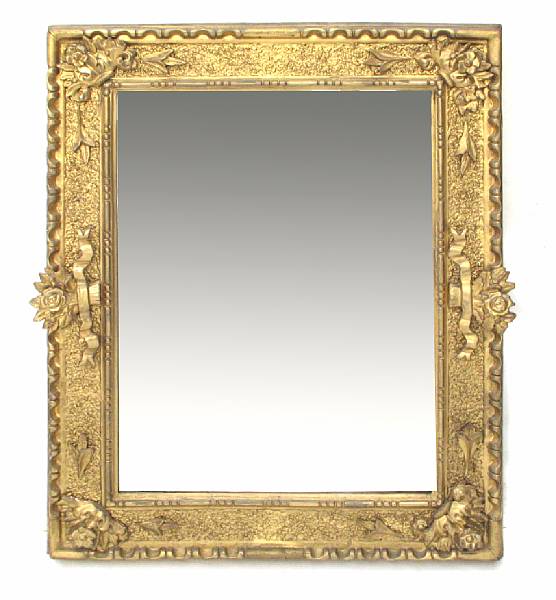 Appraisal: A Continental carved giltwood and gesso mirror height in width