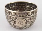 Appraisal: A Victorian silver bowl with embossed decoration and armorial crest