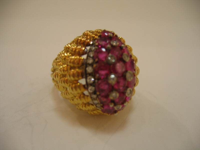 Appraisal: RUBY AND DIAMOND RING k yellow gold tiered dome style