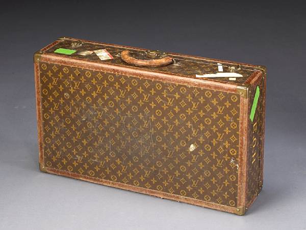 Appraisal: A Louis Vuitton hardcase suitcase first half th century height