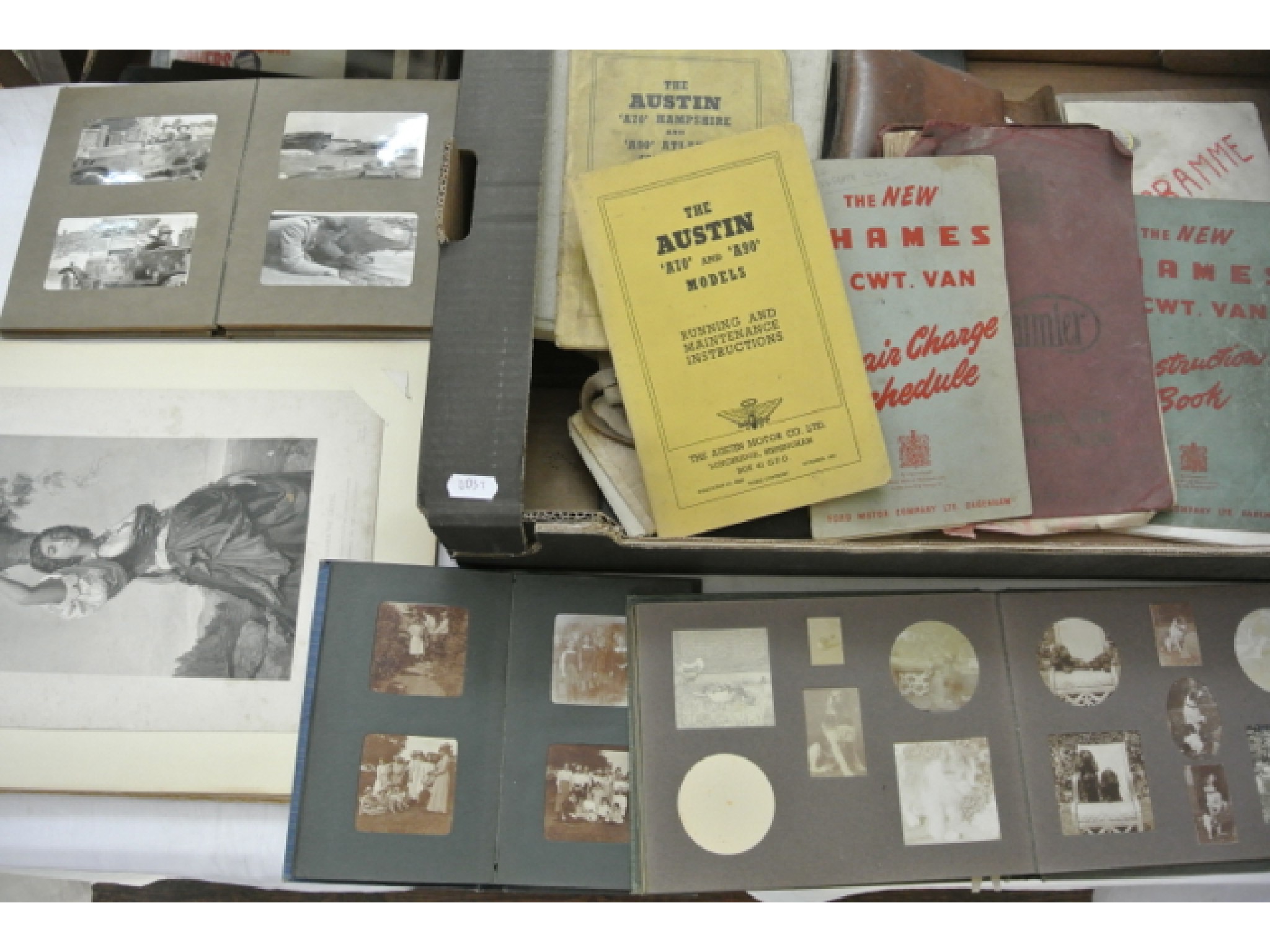 Appraisal: A collection of vintage family photograph albums and ephemera together