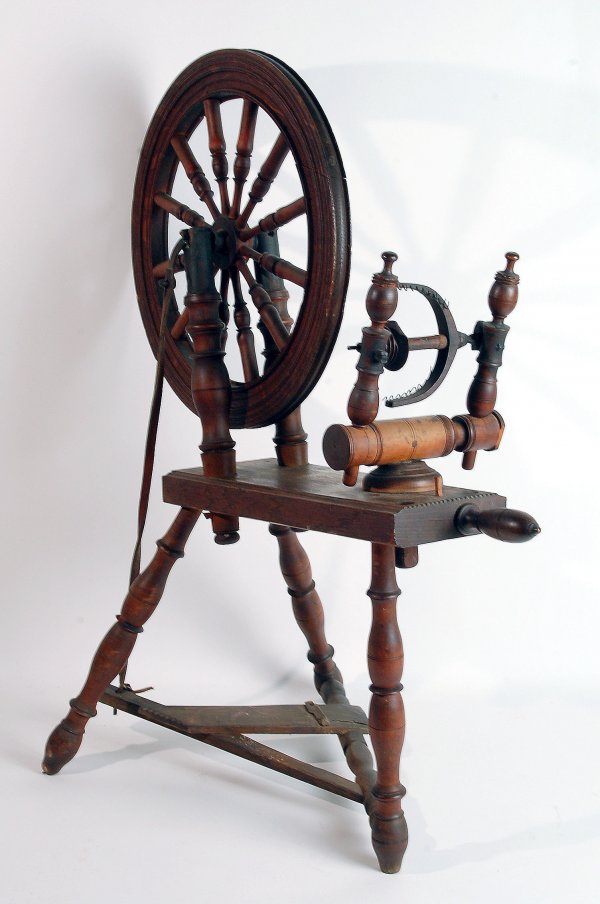 Appraisal: Miniature spinning wheel in mixed hardwoods American st half th