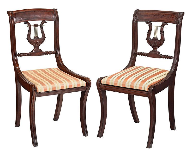 Appraisal: Two Similar Eagle and Lyre Carved Side Chairs New York