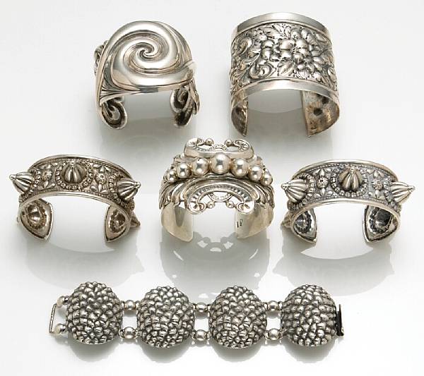 Appraisal: A collection of silver costume jewelry featuring Cini comprising five