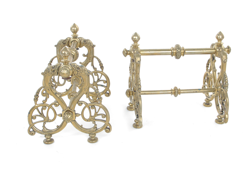 Appraisal: French brass fireplace tool rests circa scroll and bellflower design