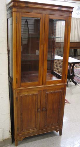 Appraisal: EMPIRE VICTORIAN TRANSITIONAL STYLE MAHOGANY DISPLAY CABINET ON CABINET American