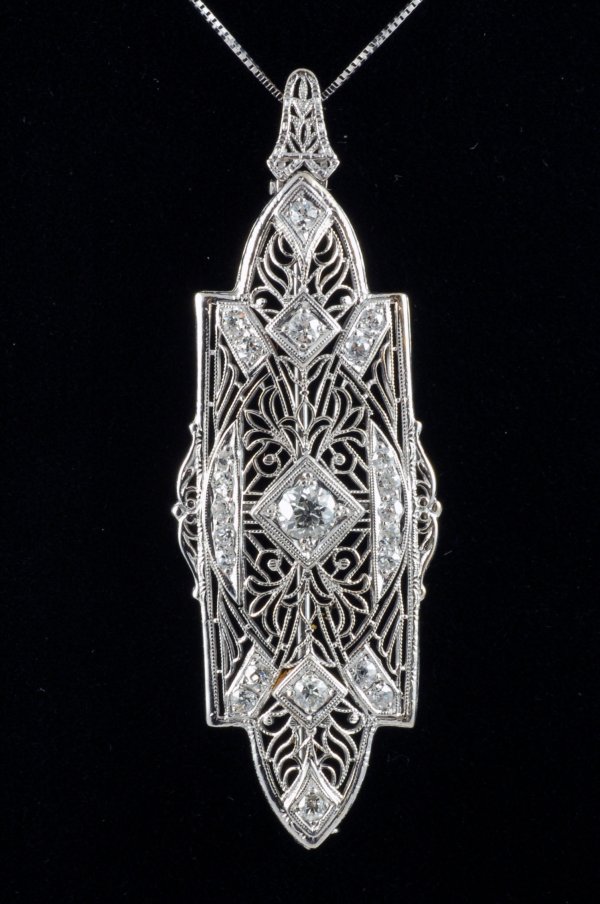 Appraisal: Diamond filigree brooch pendant Twenty-three round diamonds bead set mm