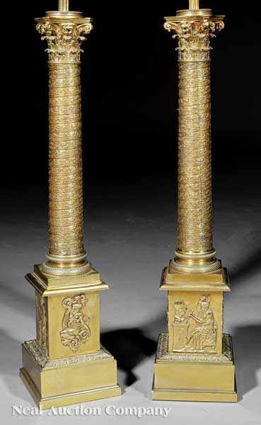 Appraisal: A Pair of Empire-Style Brass Lamps th c with Corinthian