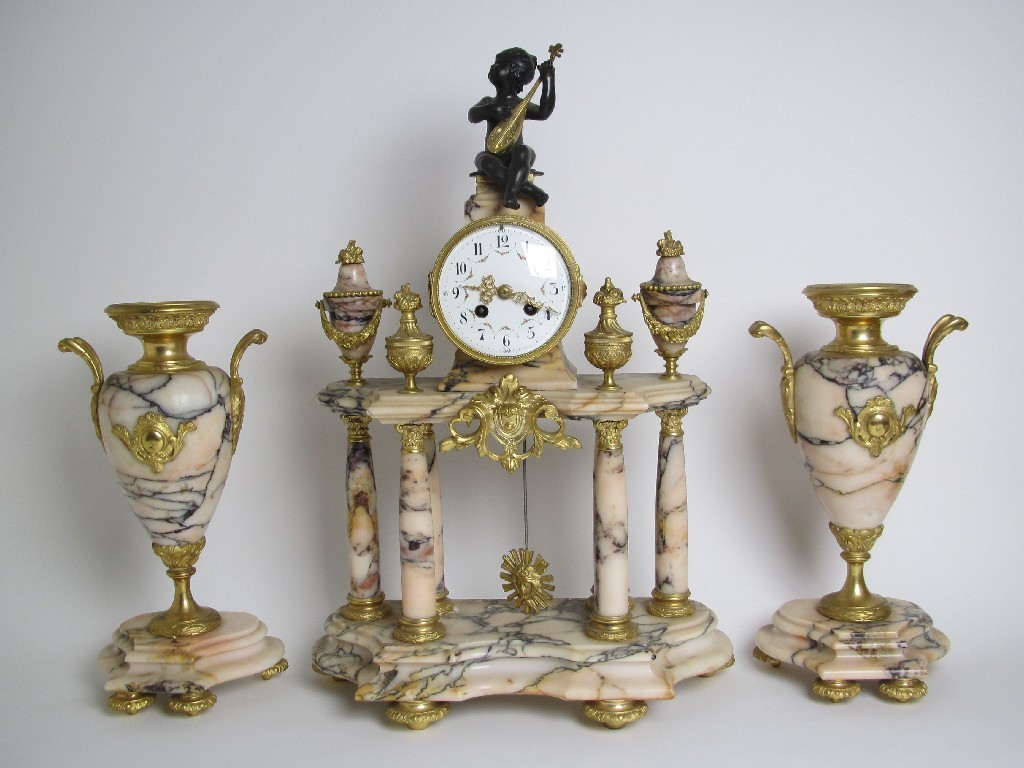 Appraisal: A Louis XVI style marble and gilt metal clock garniture