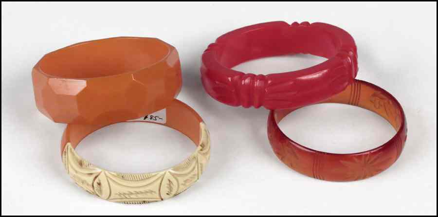 Appraisal: TWO BAKELITE BRACELETS Together with an orange plastic bracelet and