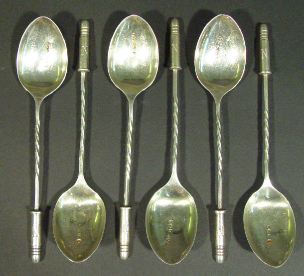 Appraisal: Set of six military interest silver teaspoons with shell case