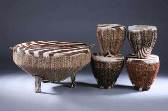 Appraisal: FIVE AFRICAN ZEBRA SKIN DRUMS - Largest in x in