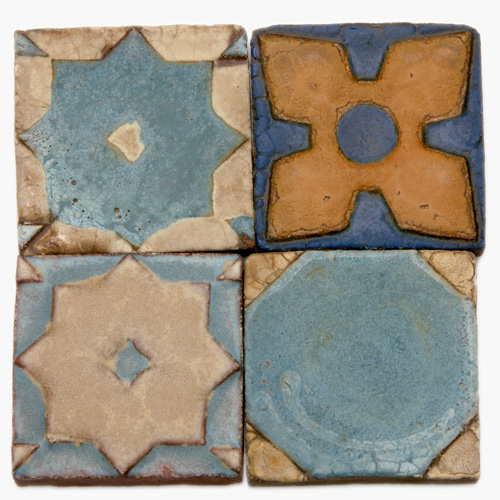 Appraisal: GRUEBY Fifty-nine geometric tiles Thirteen with a raised octagonal pattern