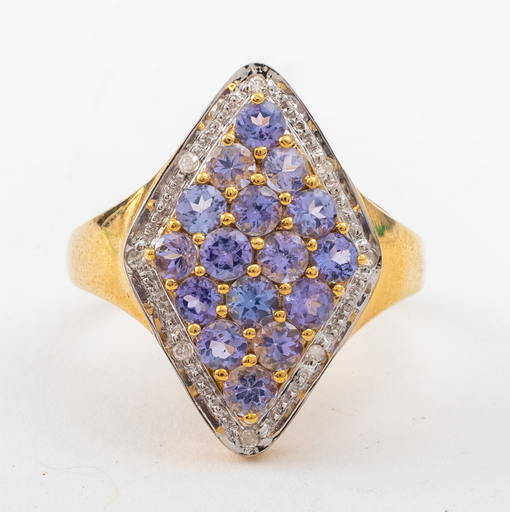 Appraisal: K YELLOW GOLD TANZANITE AND DIAMOND RING K yellow gold