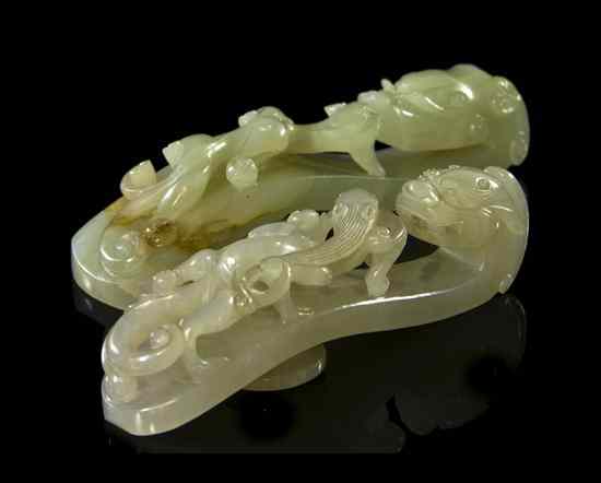 Appraisal: A Group of Two Jade Belt Hooks of celadon and