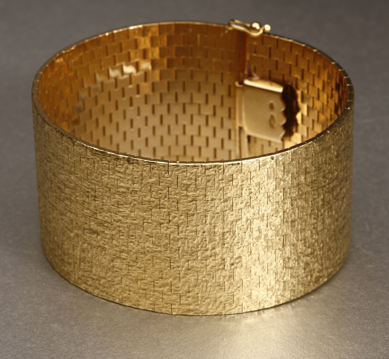 Appraisal: An K yellow gold wide bracelet An K yellow gold