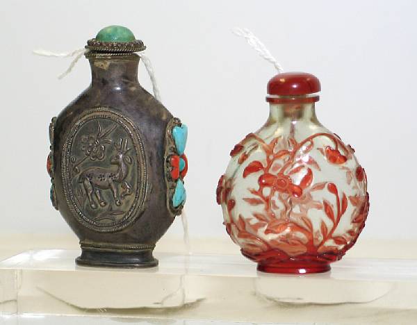 Appraisal: Two snuff bottles The first a th Century clear glass