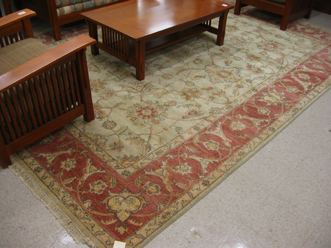 Appraisal: HAND KNOTTED ORIENTAL ROOM-SIZE CARPET Pakistani-Persian overall floral design on