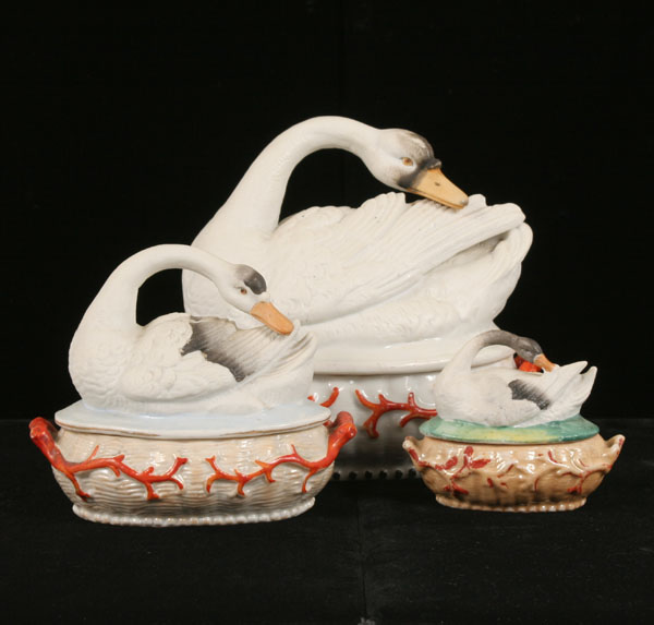 Appraisal: German Choday porcelain swans on nests three graduated birds on