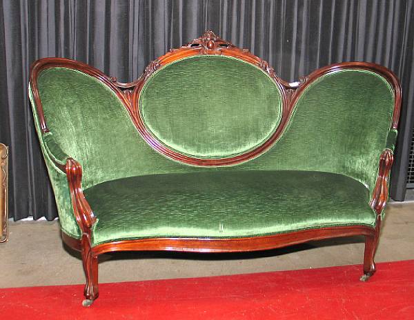 Appraisal: A Rococo Revival mahogany settee third quarter th century height