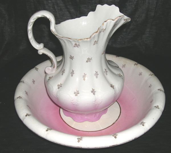 Appraisal: Goodwin Pottery Company Ohio Parcel-Gilt White and Blush Pink Two-Piece