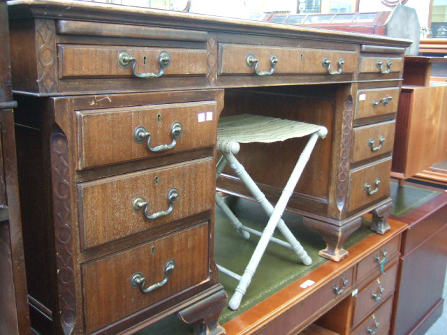 Appraisal: A George III style mahogany free standing pedestal desk the