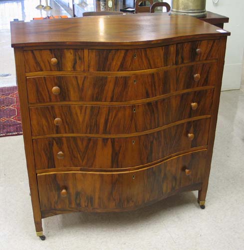 Appraisal: CIRCASSIAN WALNUT CHEST OF DRAWERS American c the serpentine front