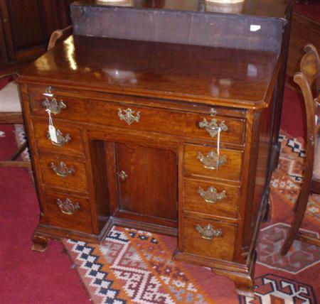 Appraisal: A George III mahogany kneehole desk the moulded rectangular top