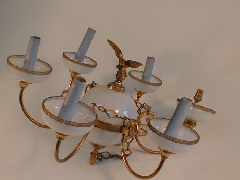 Appraisal: An opaque brass and gilt metal six light electrolier composed