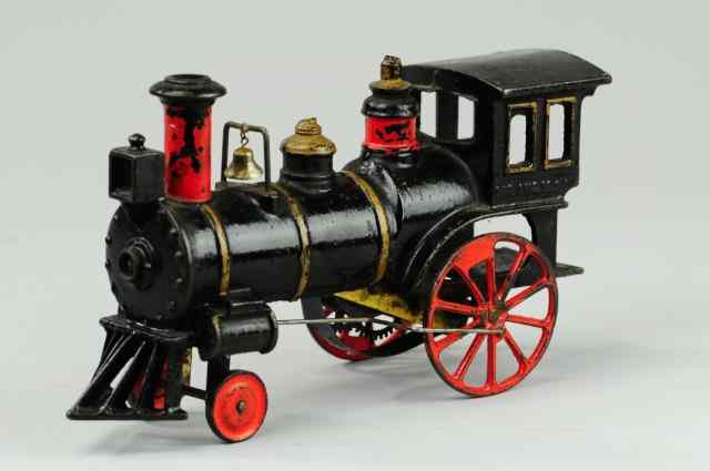 Appraisal: IVES CLOCKWORK LOCOMOTIVE Pat cast iron painted in black red