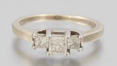 Appraisal: A Ladies' Three Princess Cut Diamond Ring k white gold