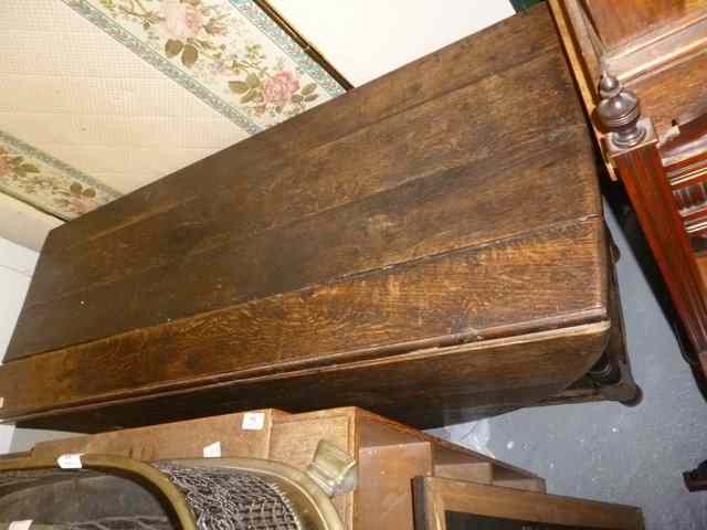 Appraisal: A LATE TH EARLY TH CENTURY OAK DROP LEAF DINING