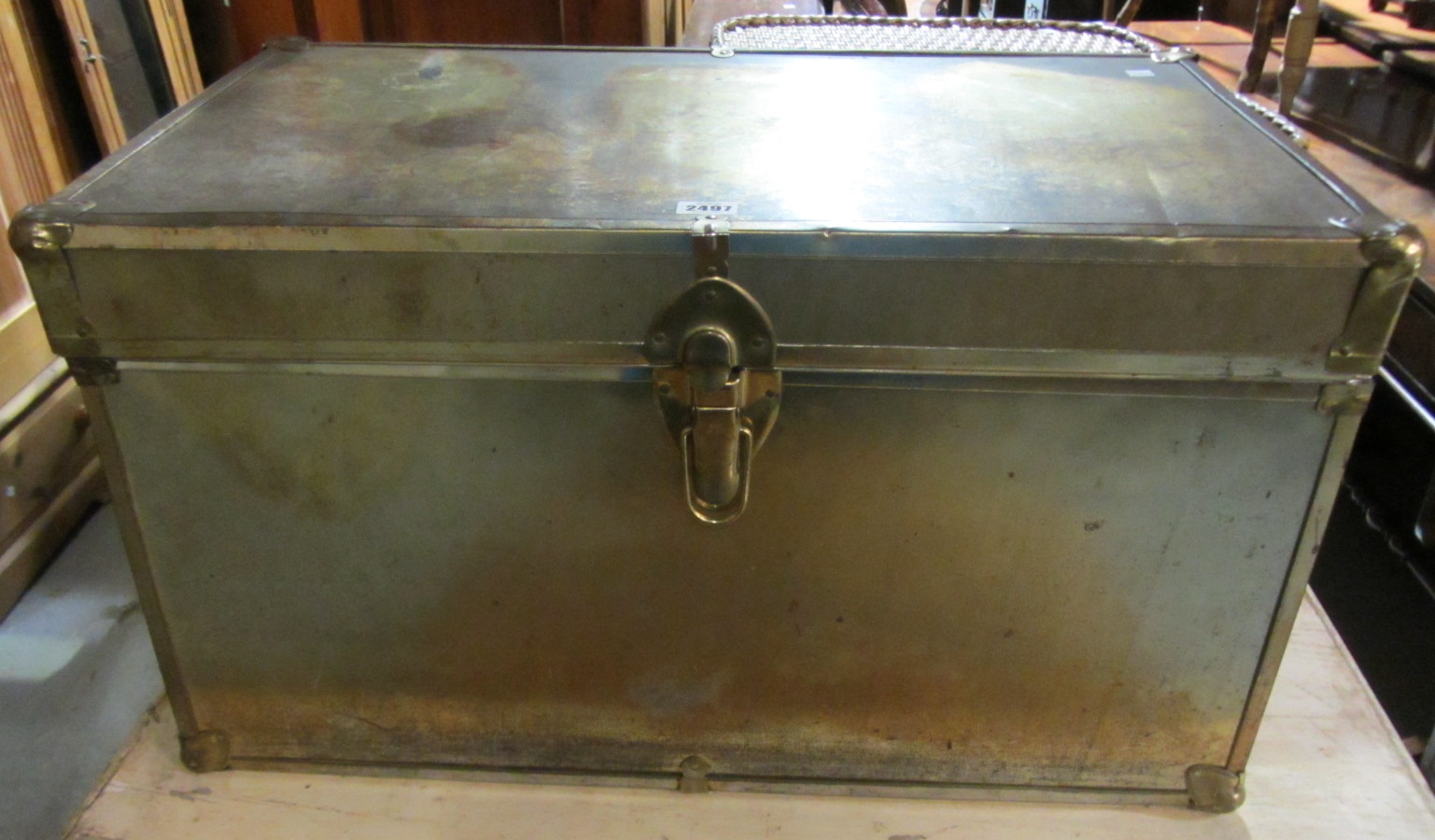 Appraisal: A brass bound storage trunk