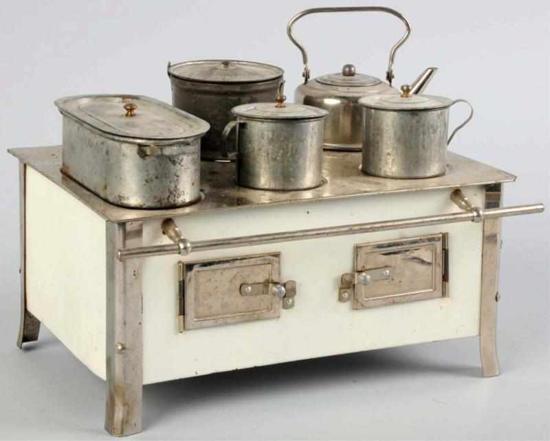 Appraisal: Early Tin Child's Toy Stove Unmarked but probably German Comes