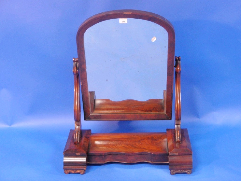 Appraisal: A Victorian flamed mahogany dressing table mirror with arched glass