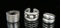 Appraisal: A Group of Three Contemporary Design Sterling Silver Rings The