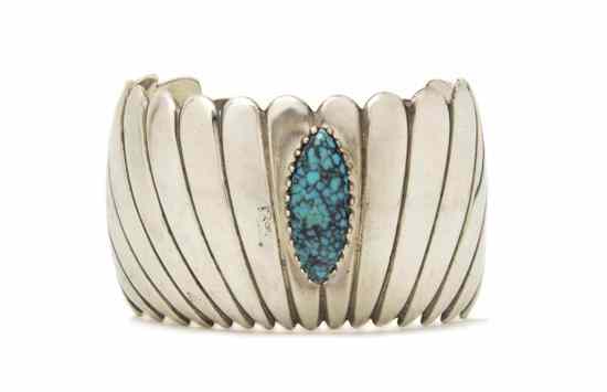 Appraisal: A Sterling Silver Cuff Bracelet having a heavily incised radiating