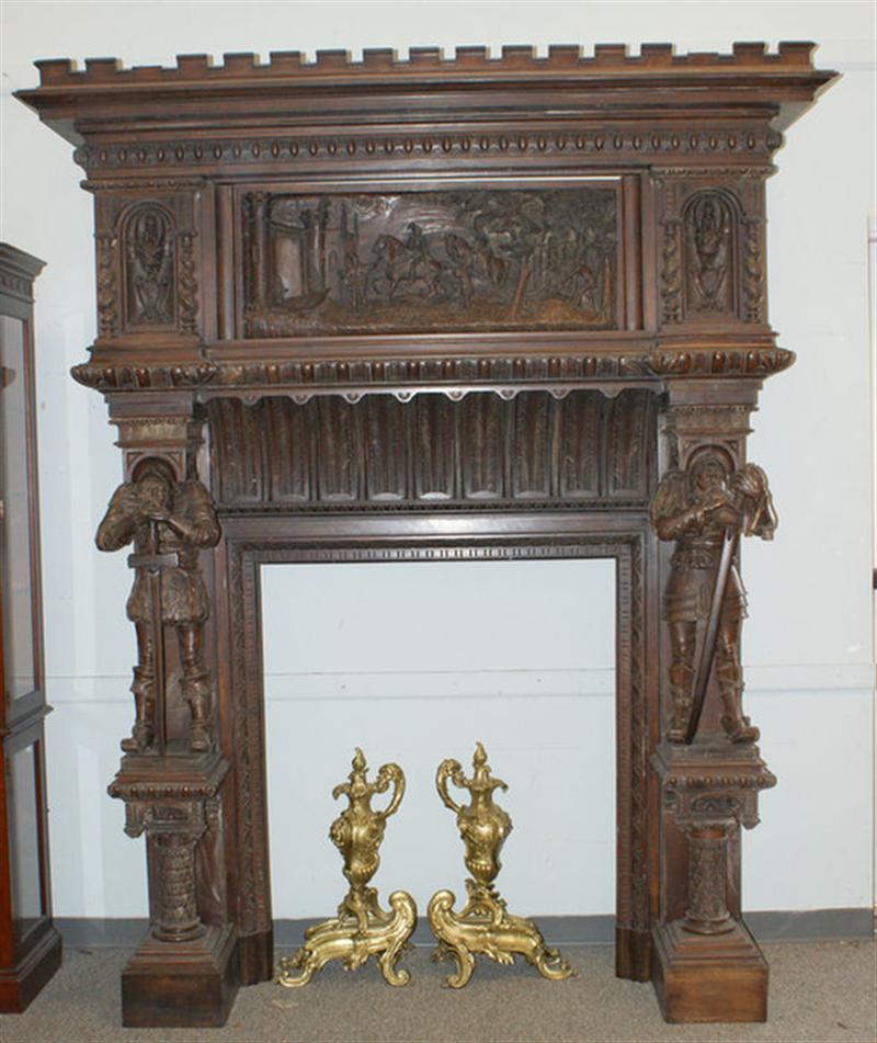 Appraisal: Figural carved walnut Continental mantle firebox opening flanked by standing