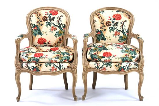 Appraisal: PAIR PAINTED LOUIS XV STYLE FAUTEUILS th century Rounded molded