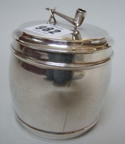 Appraisal: A silver lidded tobacco jar the detachable lid with a