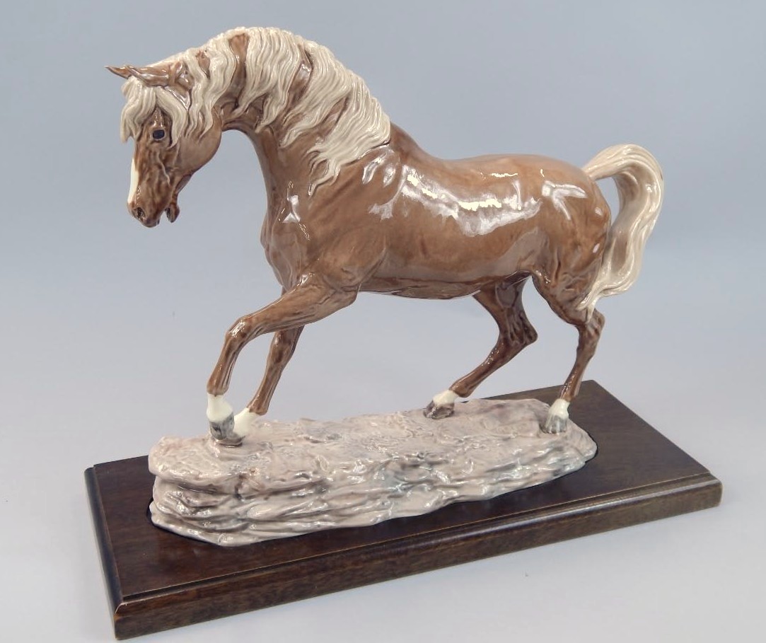 Appraisal: A Charm of Creamware figure of a horse in brown