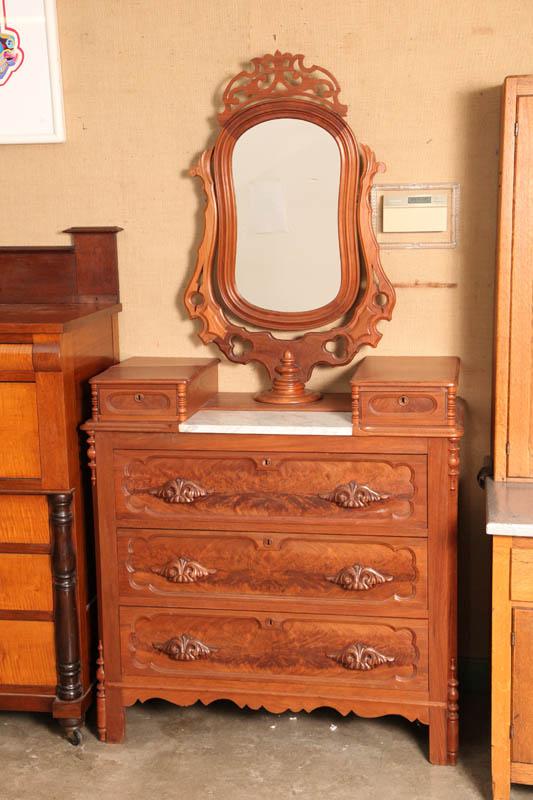 Appraisal: CHEST OF DRAWERS WITH MIRROR Walnut having an elongated mirror