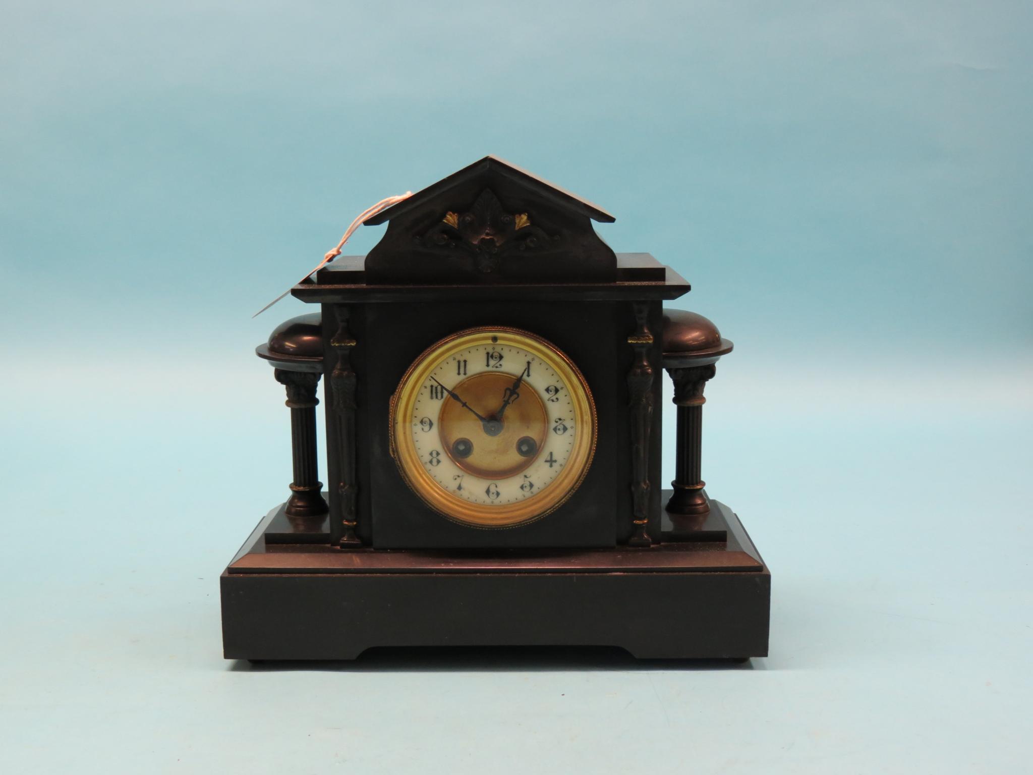 Appraisal: A Victorian black slate mantel clock architectural form with enamelled